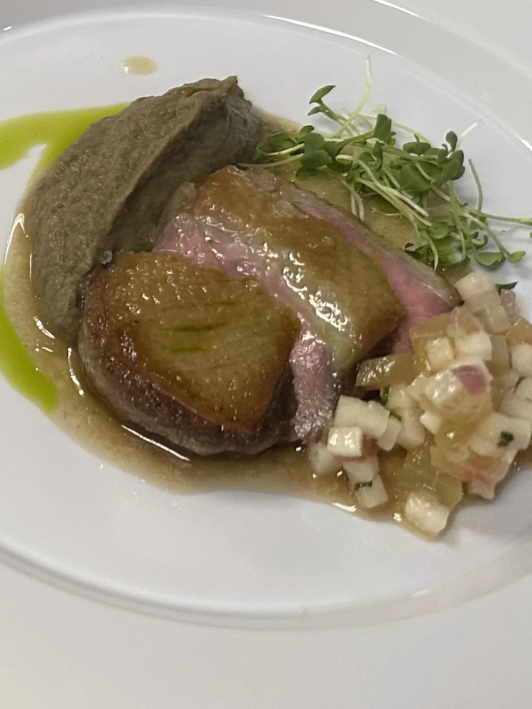 Crispy-skin duck breast with baba ganoush and jicama-peach relish
