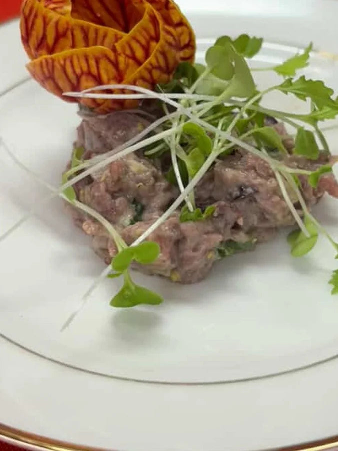 Beef tartare with a tomato rose