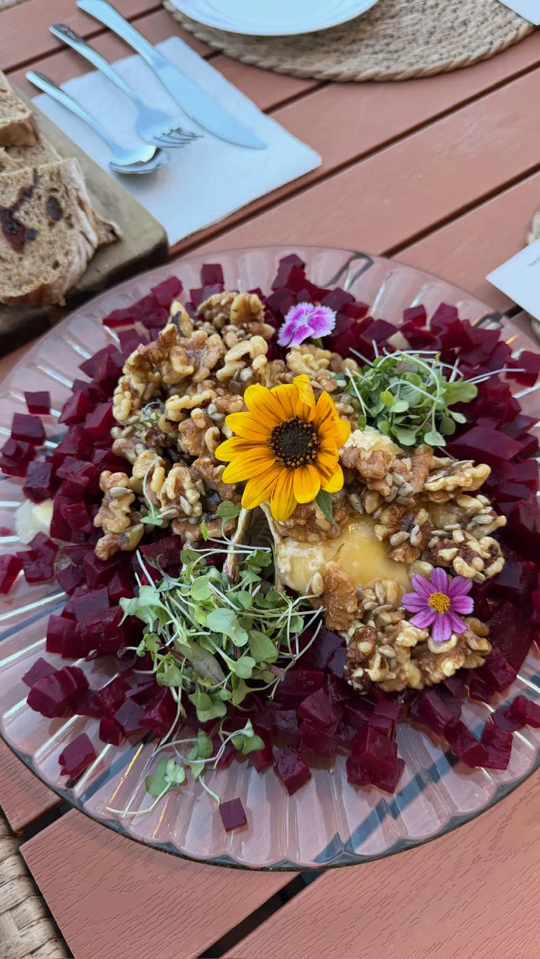 Beets with walnuts and edible flowers