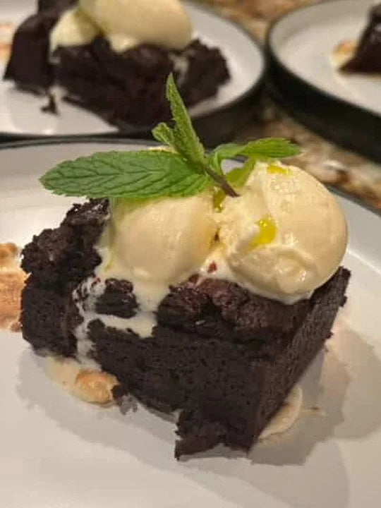Brownie with vanilla ice cream and mint