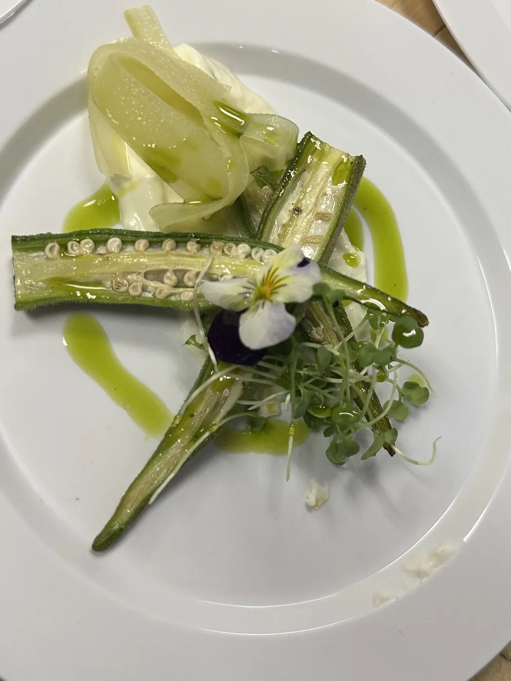 Charred okra with whipped feta and basil oil