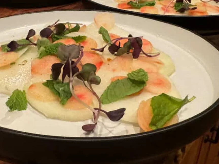 Vegetable carpaccio with mint and microgreens